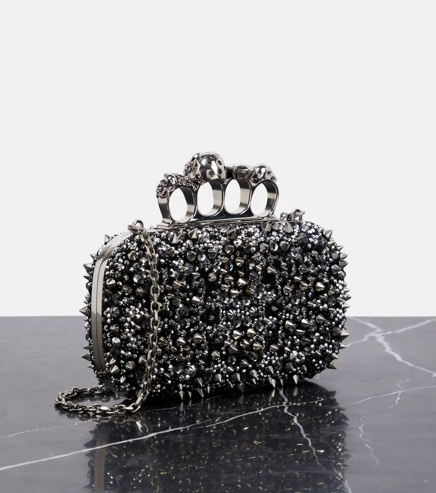 Alexander McQueen Knuckle embellished leather clutch